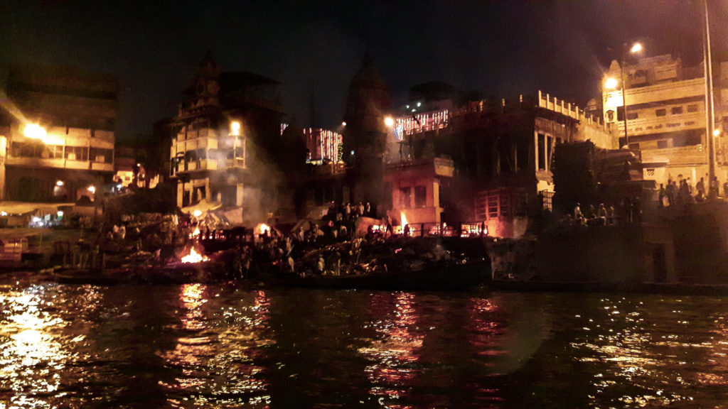 The burning fires at the Ghats. This is the place where people are cremated.
