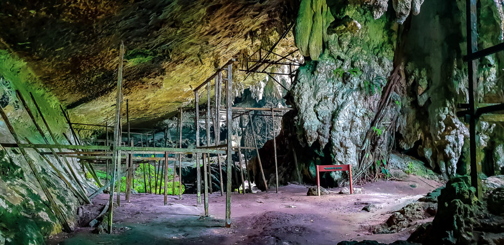 The wooden structures are still standing in the Traders Cave at Niah National Park