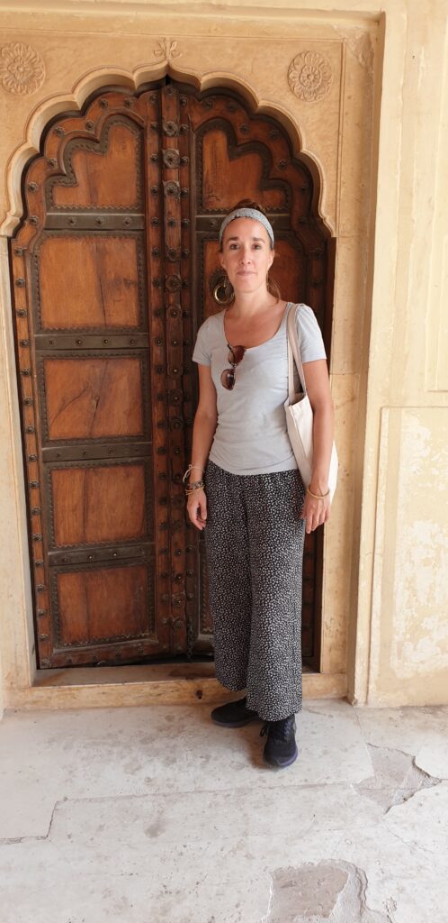 Adriana Machielsen at Amber Fort. Majestic palaces to visit or to stay at in Rajasthan, India. In the worlds jungle travel.