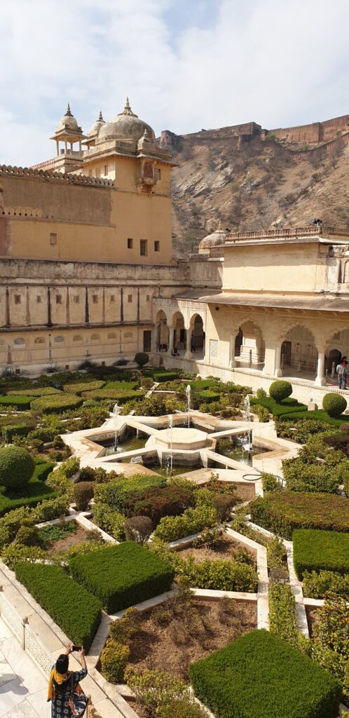 Courtyard at Amber Fort. Majestic palaces to visit or to stay at in Rajasthan, India. In the worlds jungle travel.