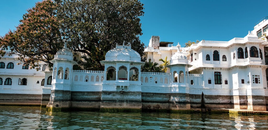White marble architecture of the Lake Palace in Udaipur. In the worlds jungle travel.
