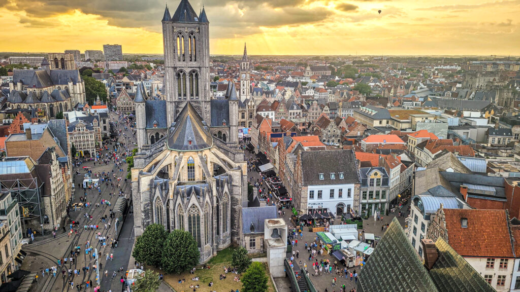 View of Saint Nicolas church from the Belfry in Ghent. Monumental highlights to visit in Ghent, Belgium. In the worlds jungle.