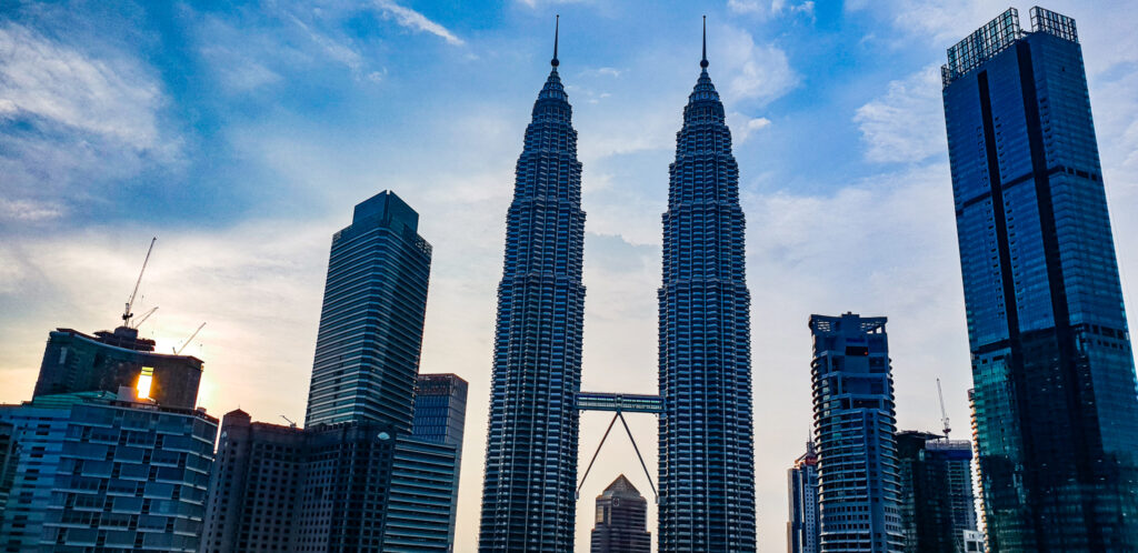 Petronas Twin Towers in Malaysia. The best eSIM for international travel. In the worlds jungle travel blog. 