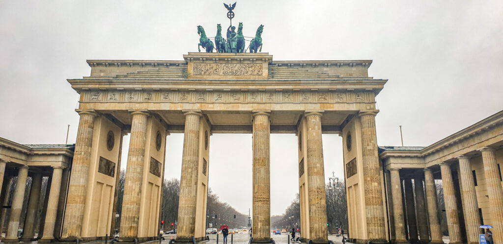 Monumental highlights to visit in Berlin: The Brandenburg gate. In the worlds jungle.