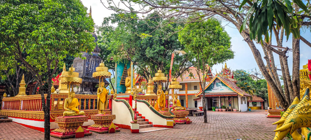Wat That, the largest temple in Vang Vieng. Cultural and natural highlights to see and do in Vang Vieng, Laos. In the worlds jungle travel blog. 