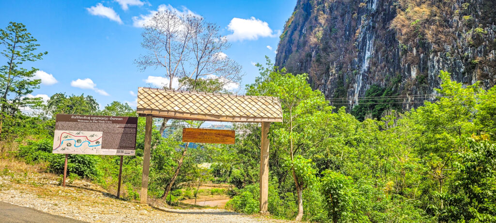 Entrance of the Pha Thok Caves. Cultural and natural highlights in Nong Khiaw in Laos. In the worlds jungle travel blog. 