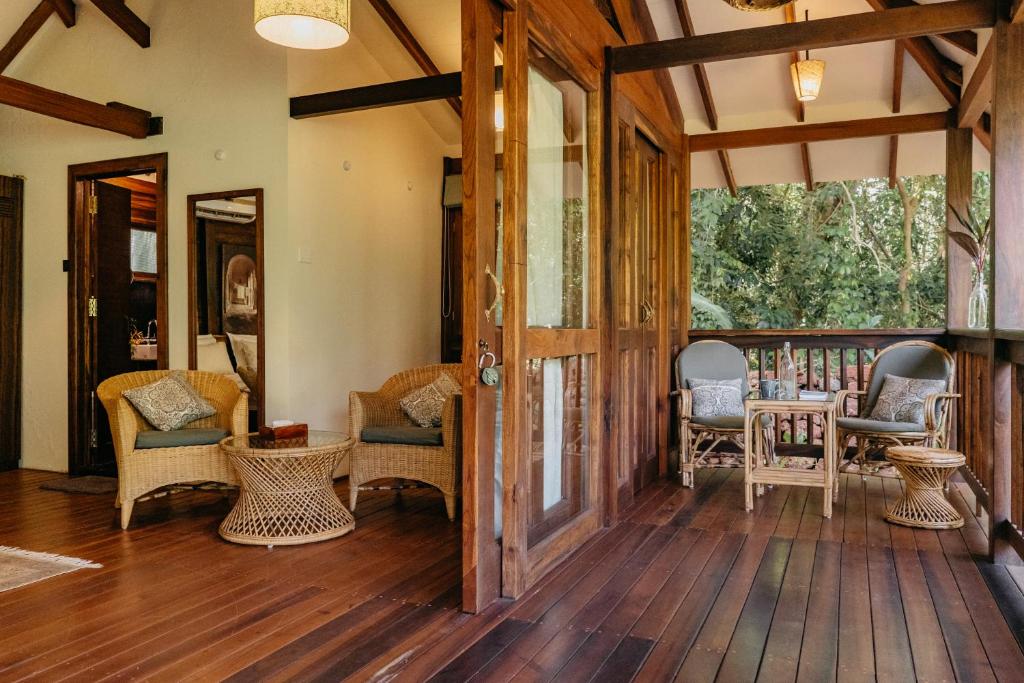 Lounge and terrace at Mojigao - Eco Resort. Best luxury hotels & resorts in North Goa rated 8.5+ for an unforgettable getaway