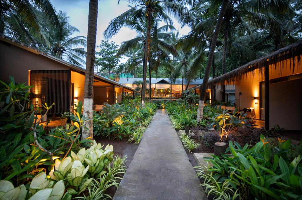 Beautiful garden at Palma Beach resort. Goa Best luxury hotels & resorts in North Goa rated 8.5+ for an unforgettable getaway.