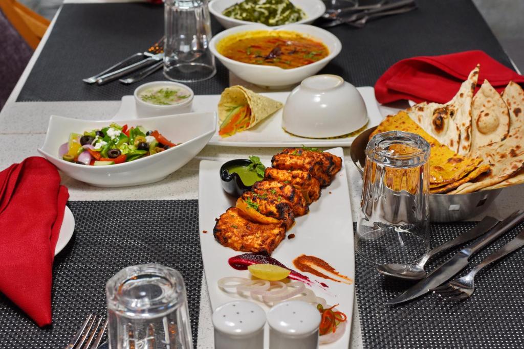 Indian food at Hotel Blue Pearl. New Delhi Historical Travel Guide: famous monuments, forts & heritage spots to visit