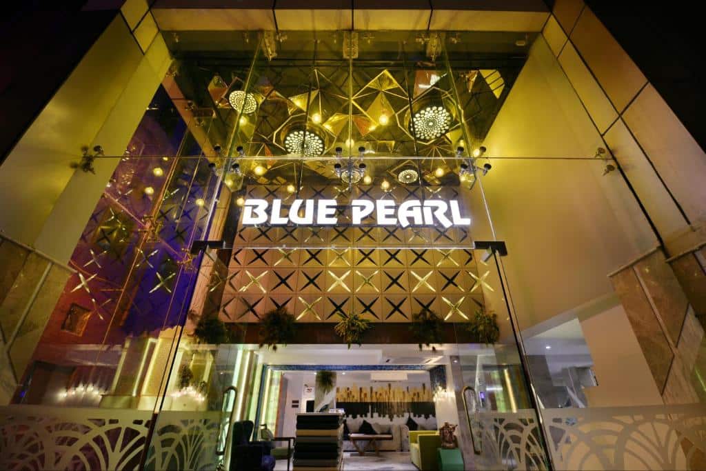 Glass entrance at Hotel Blue Pearl. New Delhi Historical Travel Guide: famous monuments, forts & heritage spots to visit