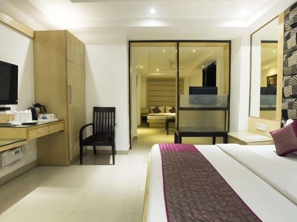 Suite with two rooms area at Hotel Krishna Deluxe. New Delhi Historical Travel Guide: famous monuments, forts & heritage spots to visit