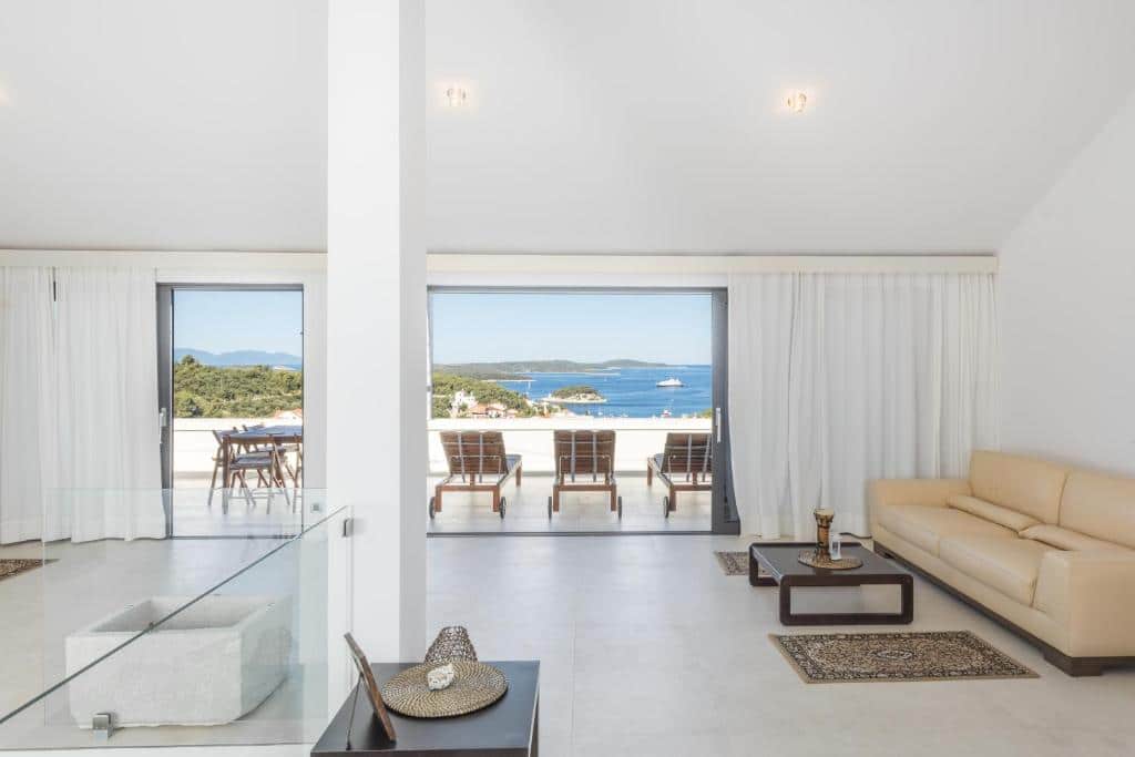Living room and terrace with amazing view of the ocean at Maki exclusive apartments. . Hvar Island Itinerary: top sights, beaches, and hidden gems