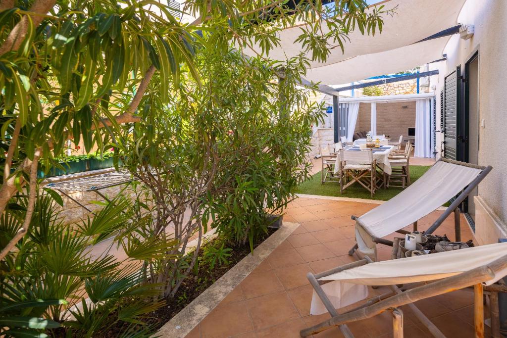 Garden terrace at Maki exclusive apartments. . Hvar Island Itinerary: top sights, beaches, and hidden gems