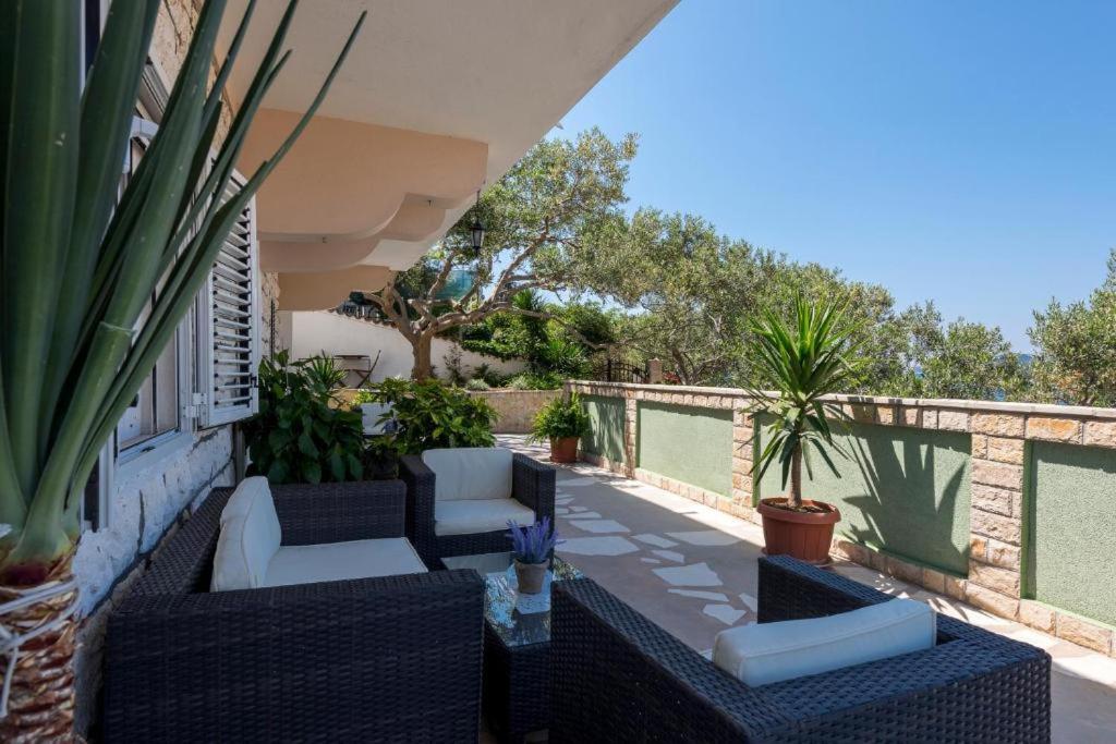 Lounge chairs on the terrace at Relaxing Beach Holiday House. Hvar Island Itinerary: top sights, beaches, and hidden gems
