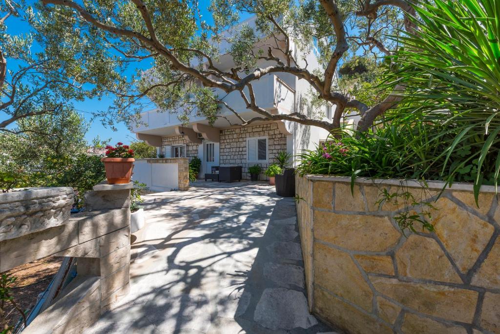 Exterior and front yard at Relaxing Beach Holiday House. Hvar Island Itinerary: top sights, beaches, and hidden gems