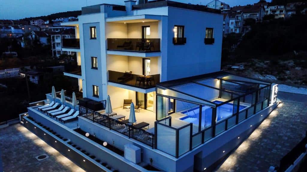 Bird-eye view of the apartments at night at Villa 23 A heated pool. Trogir & Čiovo Island: history, beaches, culture & coastal beauty