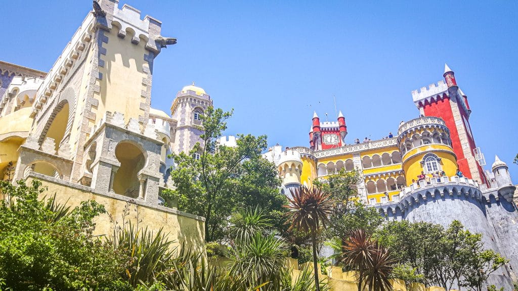 Colourful architecture of Pena palace in Sintra. Lisbon Travel Guide: what to see, do, and know before you go