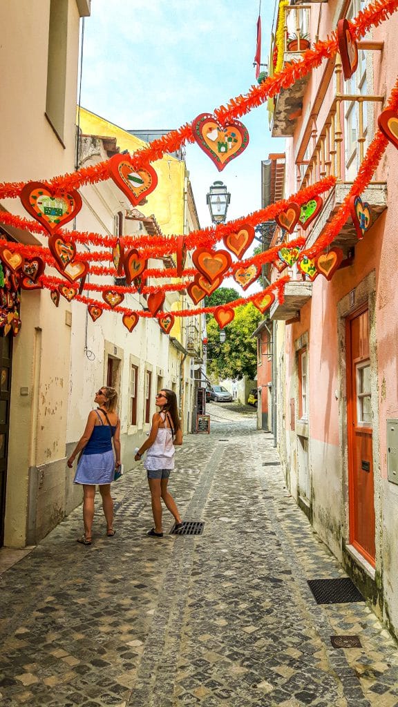 Festive decoration in alley. Lisbon Travel Guide: what to see, do, and know before you go