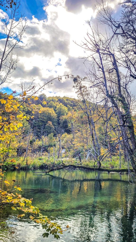 Scenic view of the hills and crystal clear lakes. Visiting Plitvice Lakes: tips, highlights, and where to stay