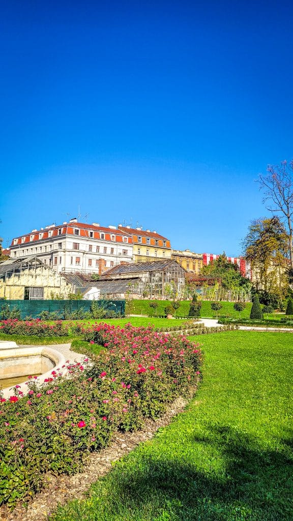 Green grass and green houses at the Botanical gardens. Zagreb Travel Tips: Best Sights, Day Trips, and Where to Stay