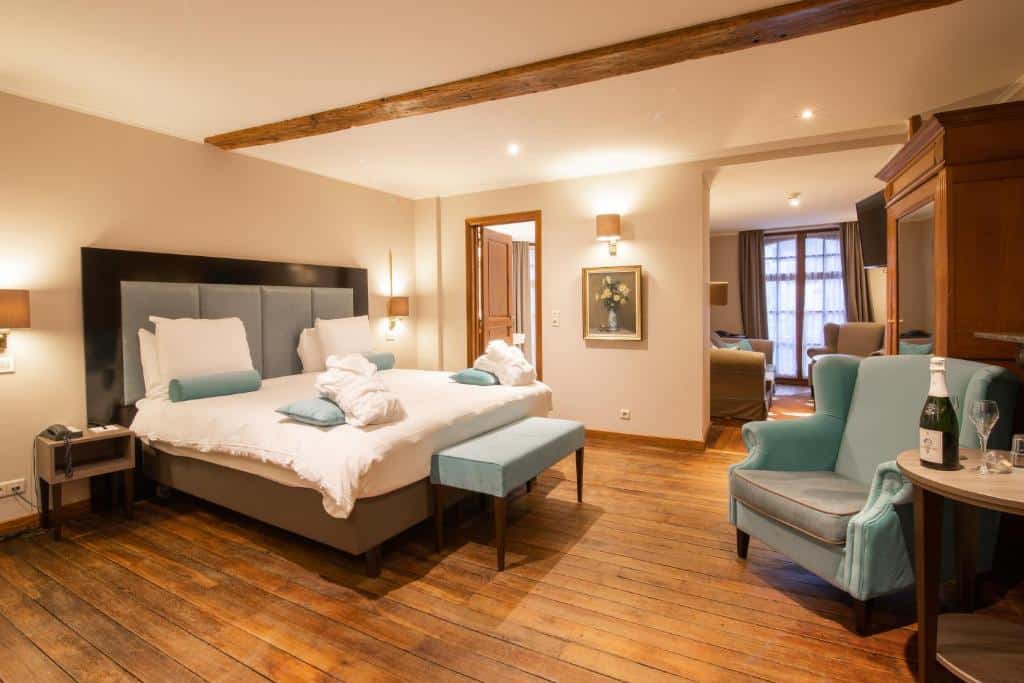 Bedroom at Hotel de la Poste - Relais de Napoleon III. Hiking Le Tombeau du Géant in Botassart, Belgium: Trails, tips & local legends