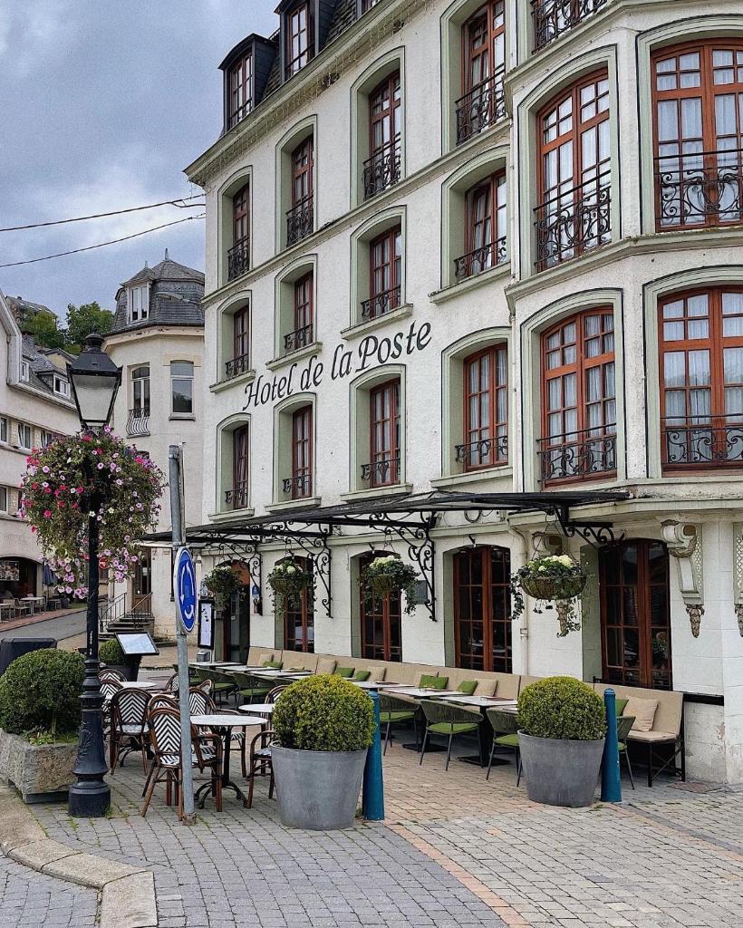 Exterior architecture of Hotel de la Poste - Relais de Napoleon III. Hiking Le Tombeau du Géant in Botassart, Belgium: Trails, tips & local legends