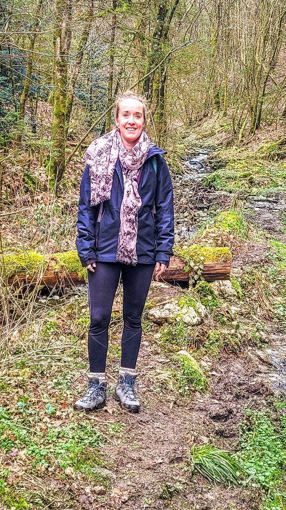 Adriana Machielsen during a 17km hike in the middle of a forest. Hiking Le Tombeau du Géant in Botassart, Belgium: Trails, tips & local legends