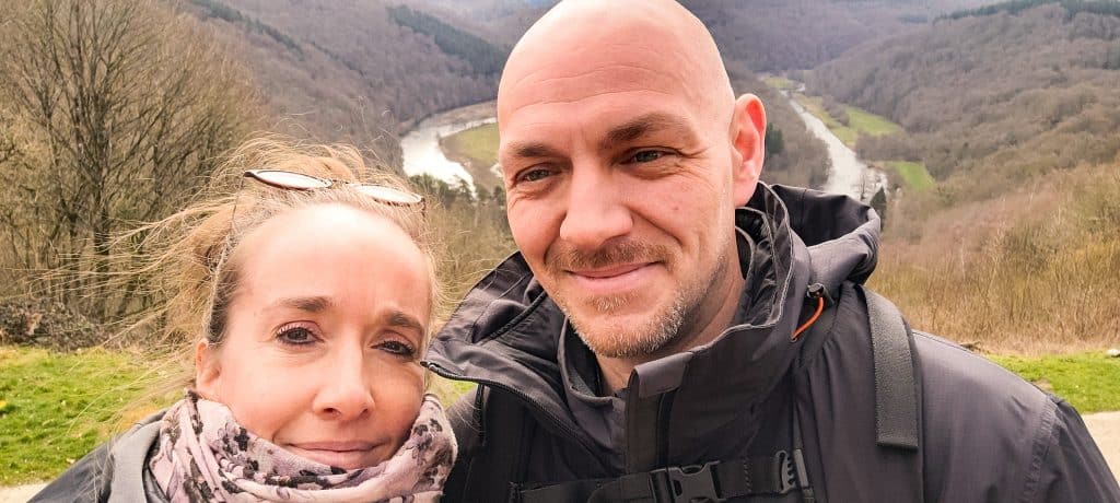 Adriana Machielsen and Kevin during the 17km hike with Tombeau du Geant on the background. Hiking Le Tombeau du Géant in Botassart, Belgium: Trails, tips & local legends