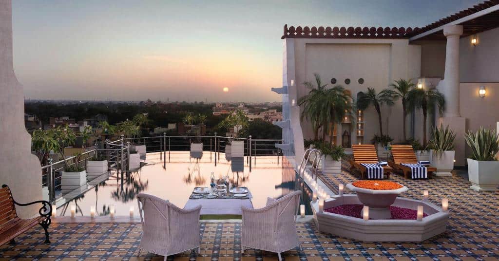 Lounge area and pool at sunset at Narendra Bhawan. Rajasthan photography tips: best photo spots & stunning prints