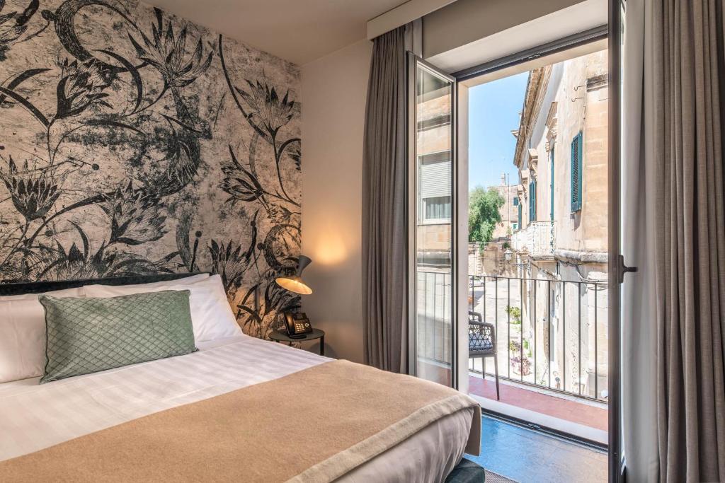 Bedroom at Arco Vecchio Urban Suite. Why Lecce Is Southern Italy's Most Underrated Travel Destination