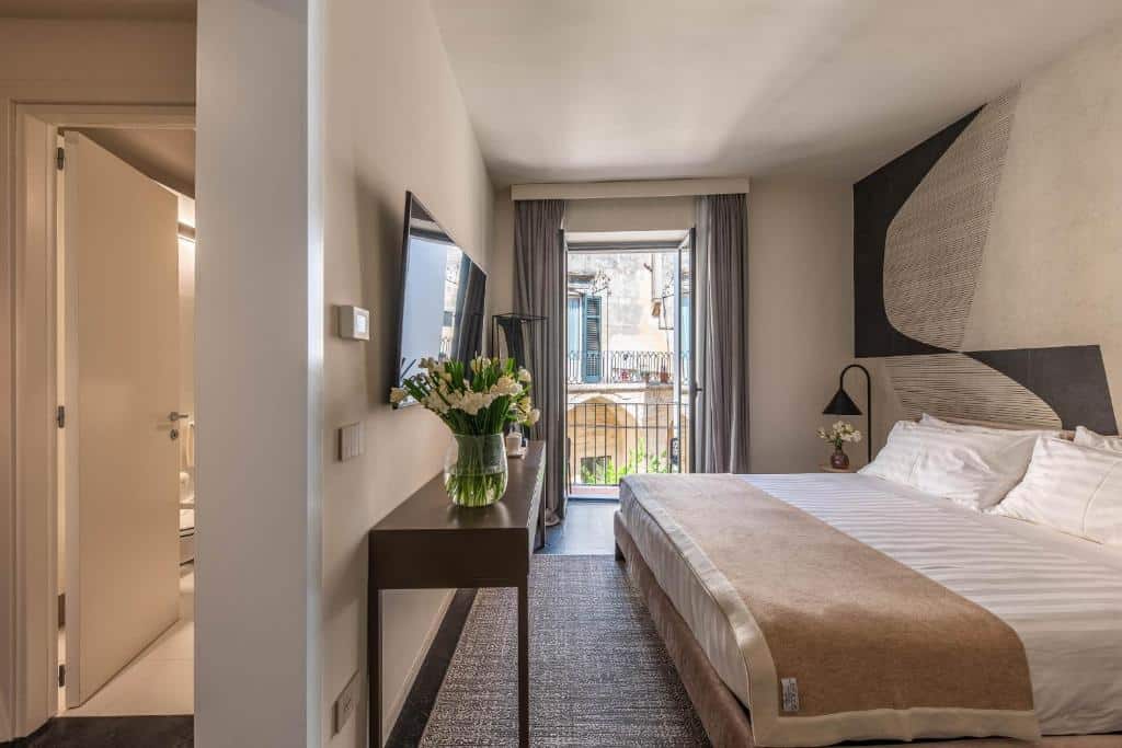 Nicely decorated hotel room at Arco Vecchio Urban Suite. Why Lecce Is Southern Italy's Most Underrated Travel Destination