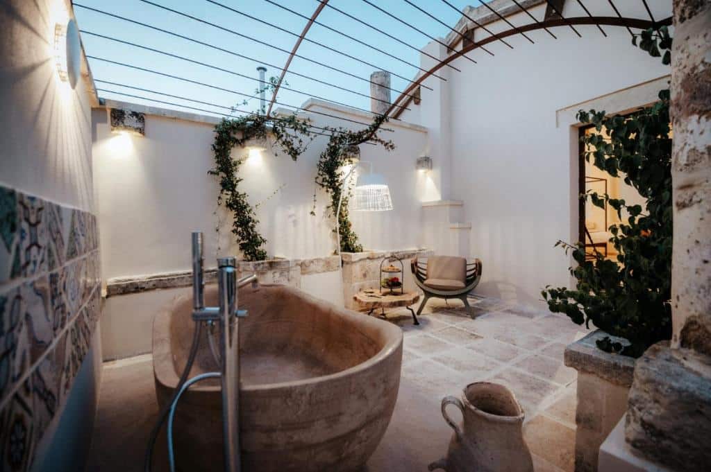 Iconic glass ceiling bathroom at Pollicastro Boutique Hotel. Why Lecce Is Southern Italy's Most Underrated Travel Destination