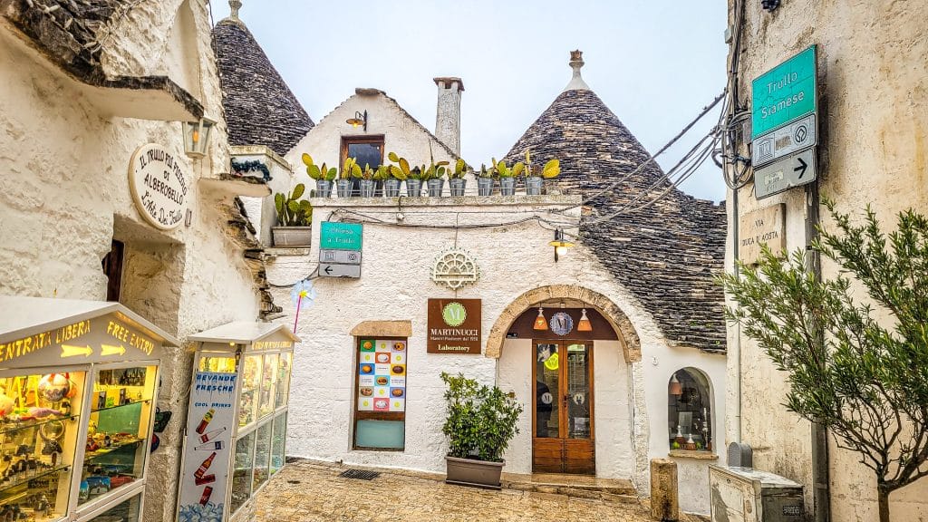 The iconic trullis in Alberobello. Bari Travel Guide: Discover Hidden Gems in Puglia’s Capital. In the worlds jungle travel blog.