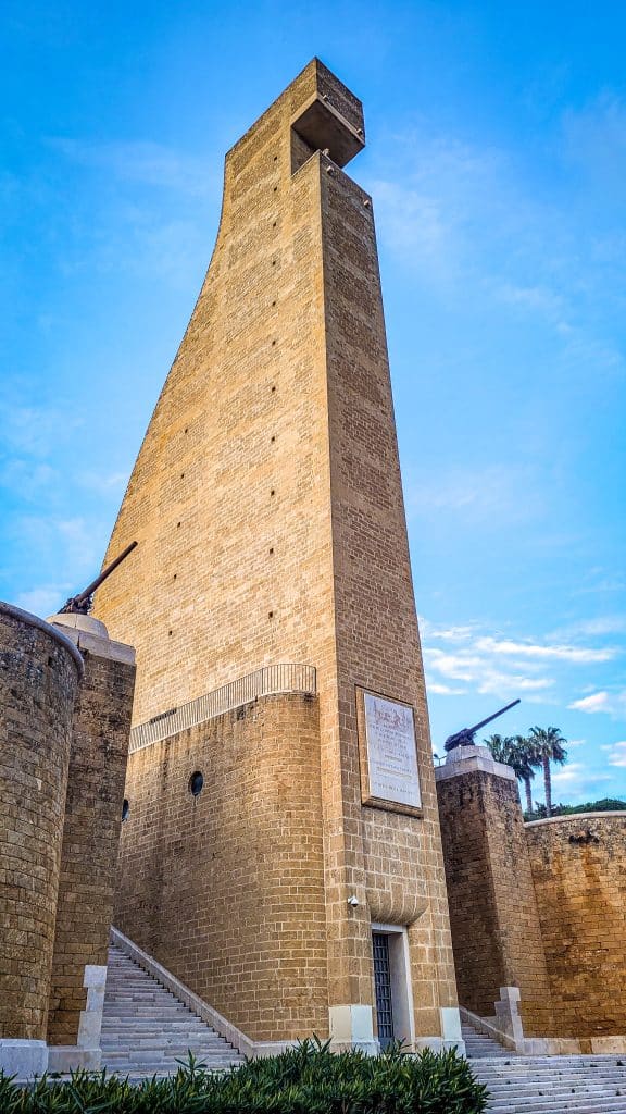 Blue sky and tall monument to the Italian Sailor. Brindisi Travel Guide: Everything You Need to Know Before You Visit