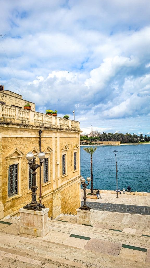 View from the stairs of the promenade and water at the Roman column. Brindisi Travel Guide: Everything You Need to Know Before You Visit