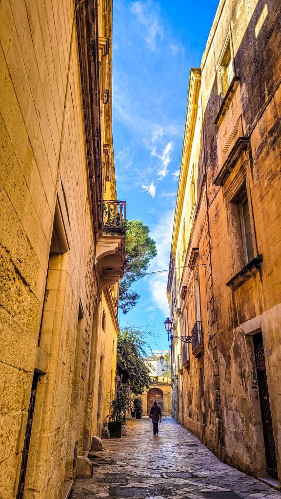 An old narrow street in the historic streets of Lecce. Why Lecce Is Southern Italy's Most Underrated Travel Destination